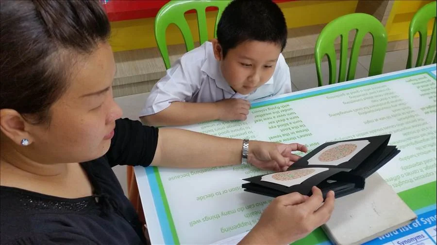 Student getting an eye exam from Eyecon
